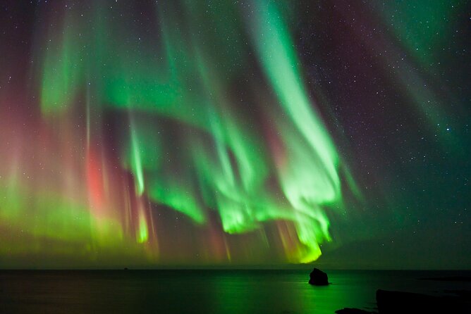 #1 Northern Lights Tour In Iceland from Reykjavik with PRO photos - Chasing the aurora beyond Reykjavik’s city glow