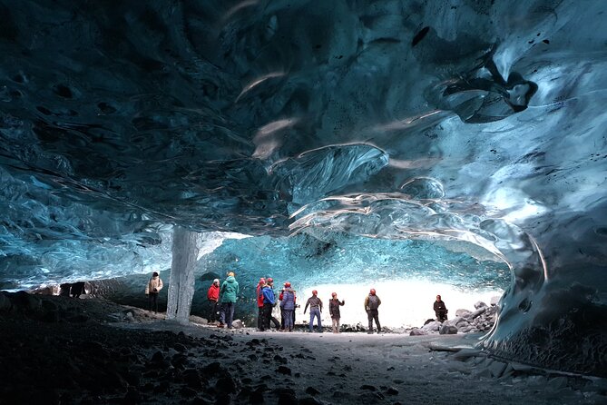 2-Day Blue Ice Cave, Glacier Lagoon and South Coast - Small Group - Entering the blue ice cave by superjeep