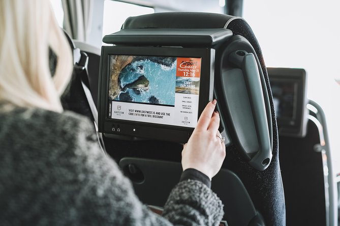Airport Transfer in Iceland from Reykjavik City to Keflavik Airport with Hotel Pick Up - The orange Airport Direct bus to Keflavik