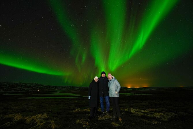 Award Winning Private Northern Lights Tour with All Inclusive - Warm suits, drinks, sweets, and the waiting game