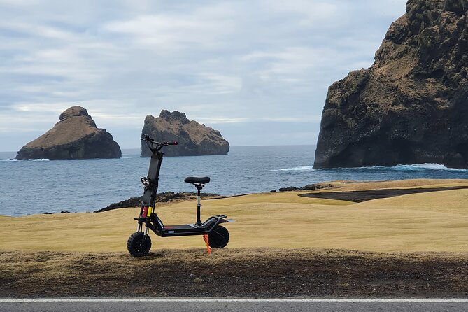 Eyjascooter volcano tour in Westman Island - Town streets first, then Westman Island views