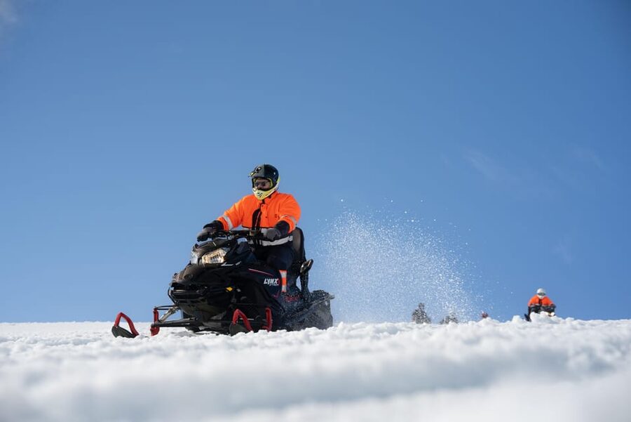 From Reykjavik: Golden Circle and Snowmobiling Tour - Strokkur erupts on a reliable rhythm