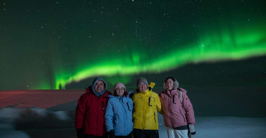 From Reykjavik: Northern Lights Guided Tour with Photos - The waiting game, with hot chocolate and blankets