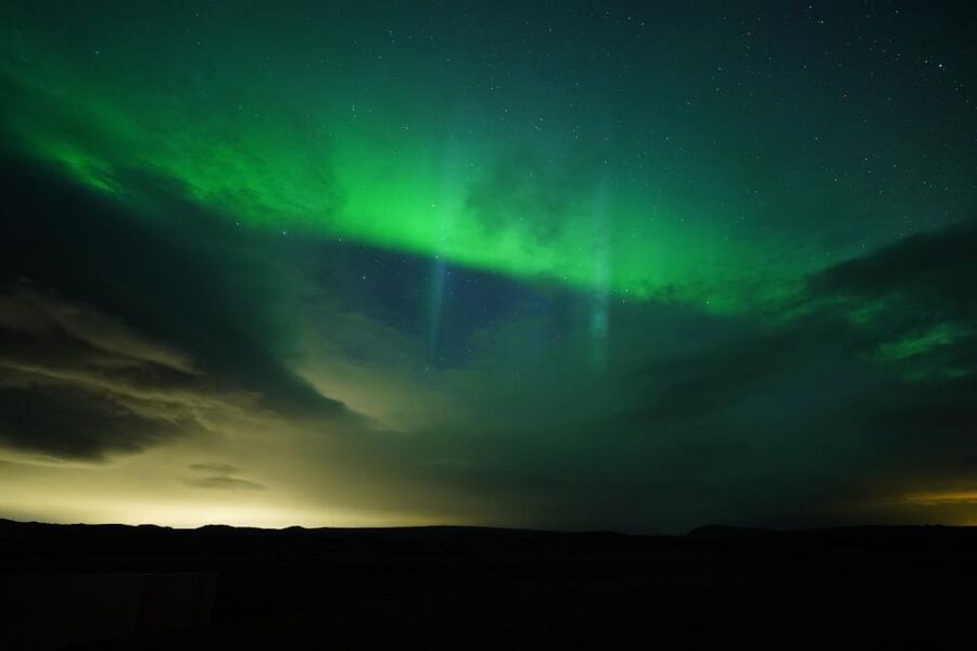 From Reykjavík: Northern Lights Tour with Hot Cocoa & Photos - One main viewing stop, with the sky as the schedule