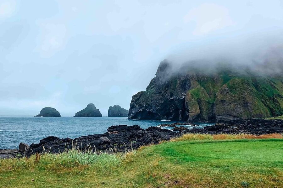 From Reykjavik: Puffin and Volcano Tour in Westman Islands - Skansinn, the harbor, and the Viking Wood Church