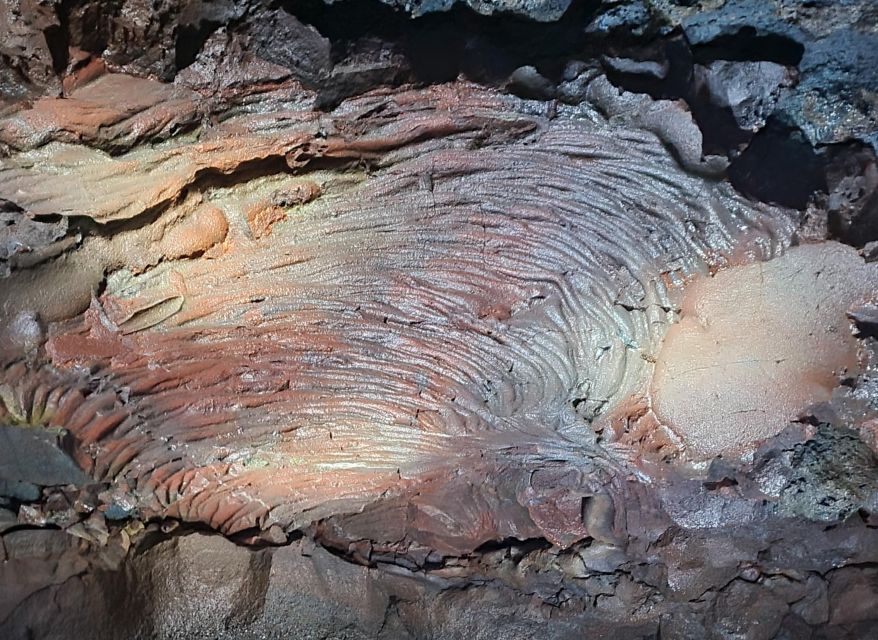 Geological Lava Tunnel Adventure - Arnarker Cave - Winter ice beside Icelandic volcanic rock
