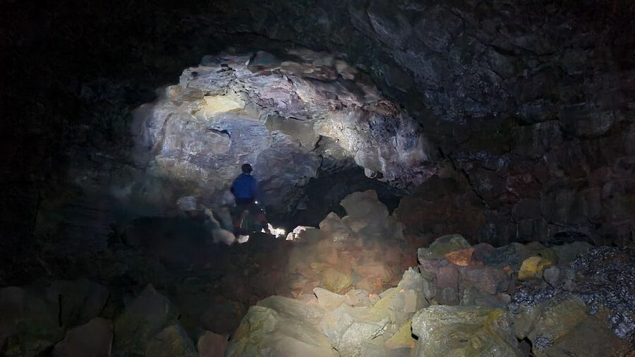 Geological Lava Tunnel Adventure - Arnarker Cave - A geologist makes the rock easier to read