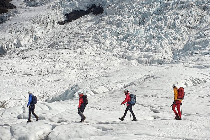 Glacier Hike from Skaftafell - Extra Small Group - Getting fitted with crampons, helmet, harness, and ice axe