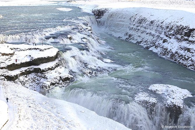 Golden Circle and Glacier Snowmobiling Day Trip from Reykjavik - Riding a snowmobile on Langjökull