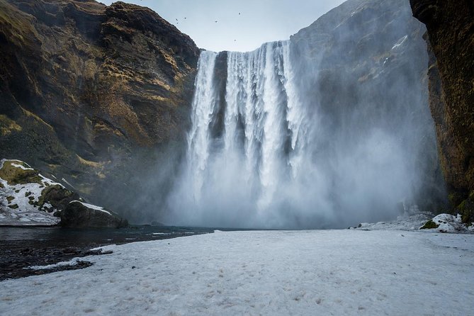 Guided Glacier Lagoon and Diamond Beach Day Trip from Reykjavik - Skógafoss: power, spray, and a Viking story