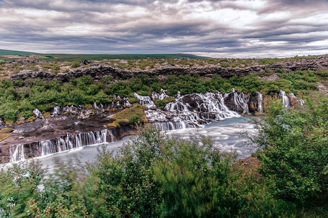 Icelandic Sagas and Glacier Cave Private Tour from Reykjavik - Farming, wool, hot springs, and lava-fed waterfalls