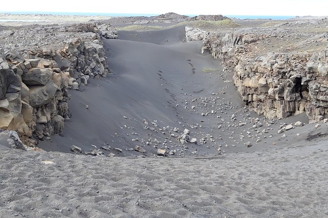 Lava, Craters and Hot Springs Private Tour - Brimketill: waves sculpting black lava