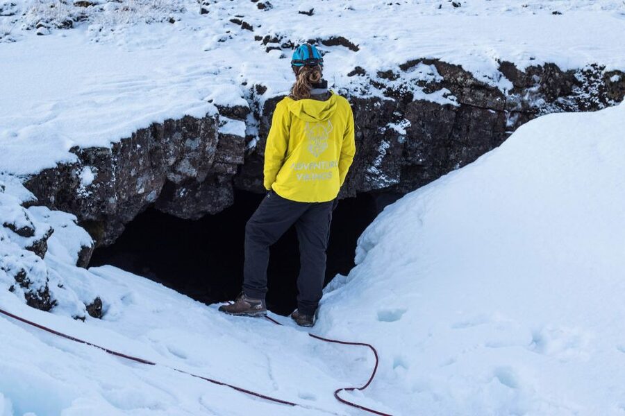 Leidarendi Cave: Lava Tunnel Caving from Reykjavik - Helmet lights, dark rock, and ancient lava shapes