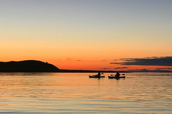 Midnight Sun Kayaking Adventure by Mt. Kirkjufell - On the water beside Kirkjufell