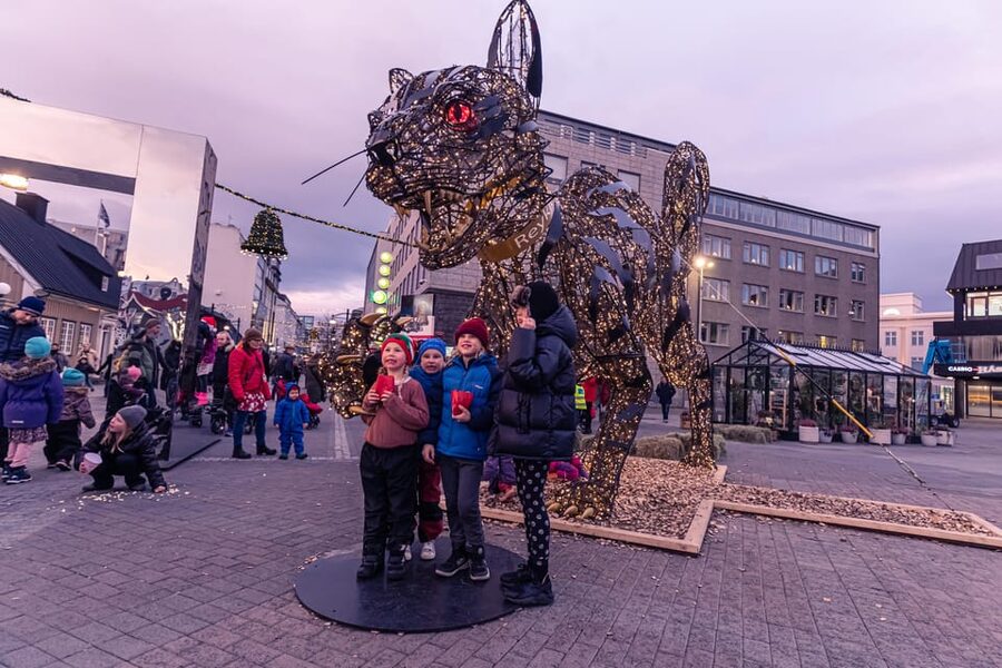 Reykjavik: Christmas Walking Tour with Icelandic Traditions - Ingólfur Square’s rink, decorations, and market stalls