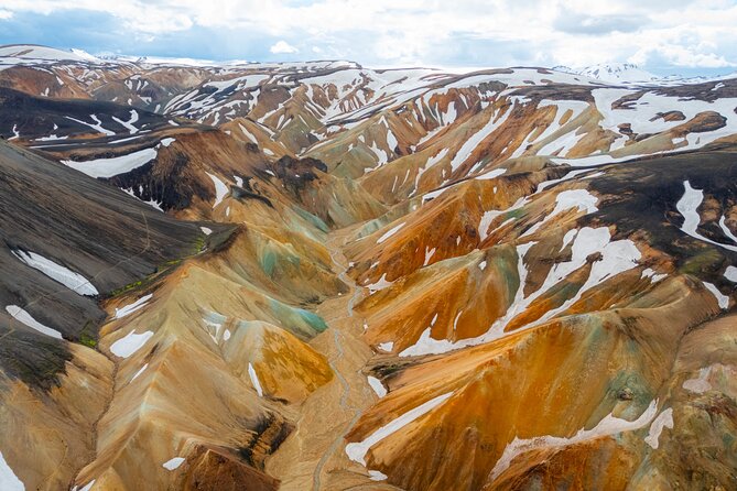 Reykjavík: Landmannalaugar & Icelandic Highlands Super Jeep Tour - Hjálparfoss, the waterfall that once meant help
