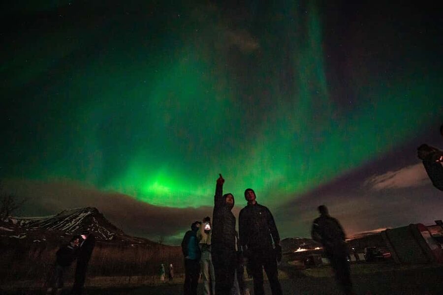 Reykjavik: Northern Lights Group Tour with Photos - Leaving Reykjavik after dark