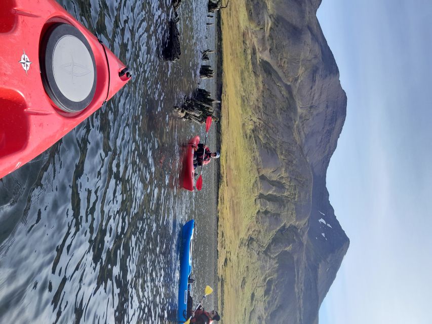 Siglufjörður / Siglufjordur: Guided kayak tour. - Getting dressed for Icelandic water