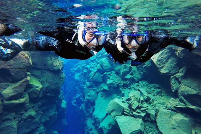 Silfra Drysuit Snorkeling Tour with Free Photos - From Reykjavik - Entering the fissure and learning the rhythm
