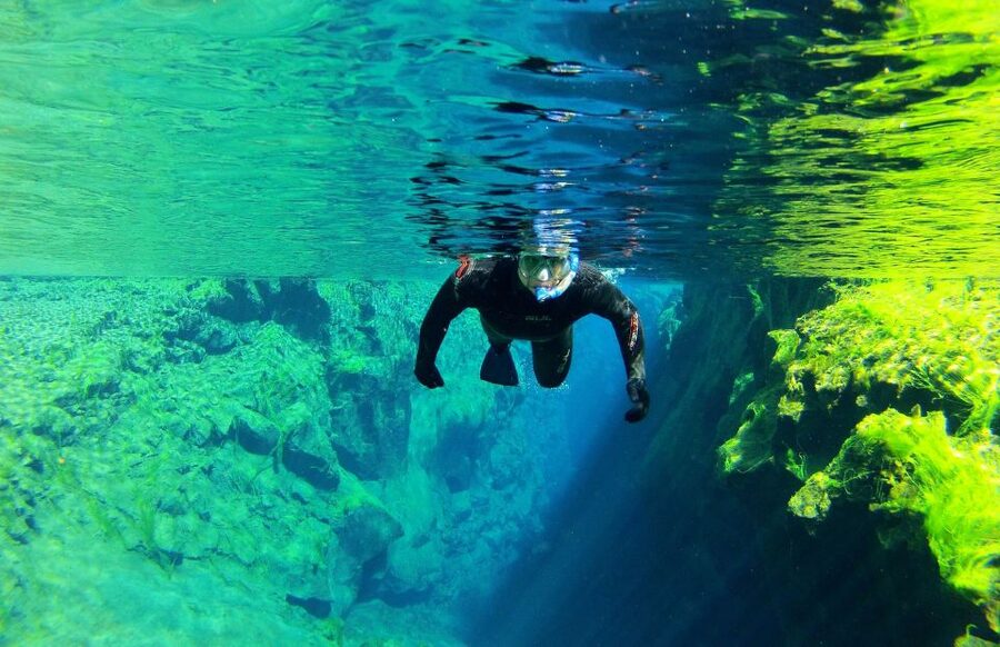 Silfra: Half-Day Snorkeling Day Trip with Underwater Photos - Safety briefing and the first minutes in Silfra