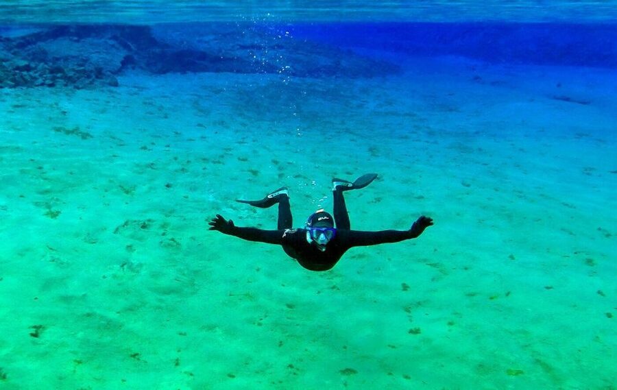 Silfra: Half-Day Snorkeling Day Trip with Underwater Photos - The blue channels and rock walls