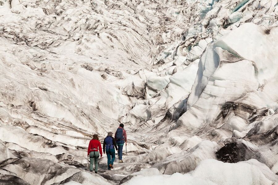 Skaftafell: Extra-Small Group Glacier Hike - Getting fitted with crampons at the glacier base