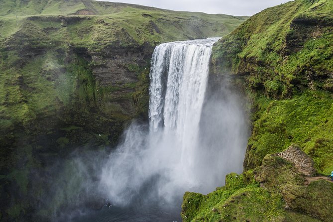 South Coast Highlights & DC-3 Plane Wreck Small-Group Tour - Skógafoss: a 60-meter waterfall with a choice of effort