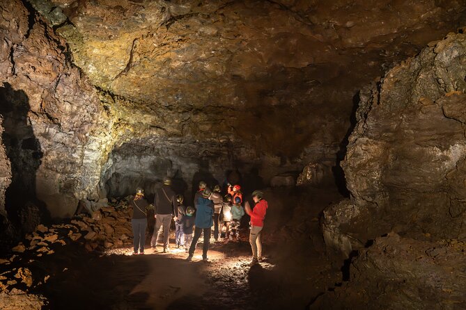 Vatnshellir Cave Tour - The first steps: helmets, lights, and spiral stairs