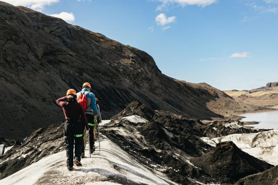 Vik: Guided Sólheimajökull Glacier Hike - Reaching the ice from the Sólheimajökull parking lot