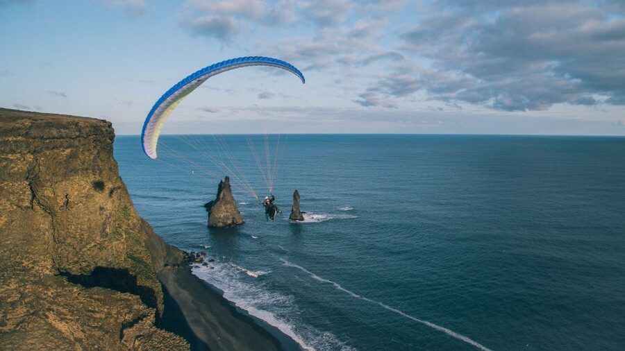 Vík: Paragliding Tandem Flight - Keeping warm above the South Coast