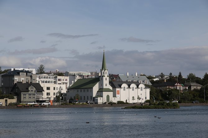 Walking tour of Reykjavik city - Austurvollur Square: parliament, buildings, and public life
